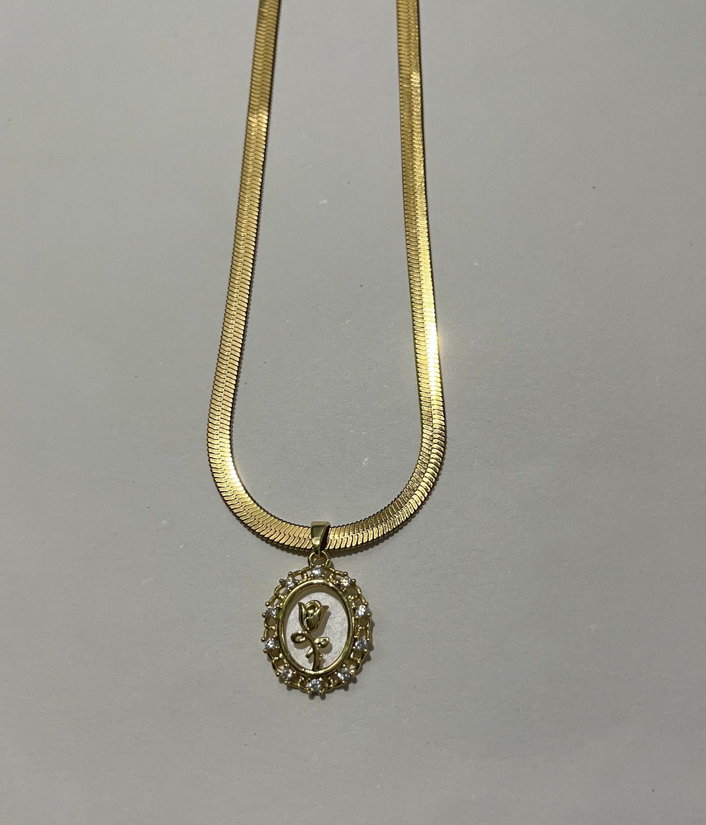 Elegant Gold Necklace with Rose Pendant