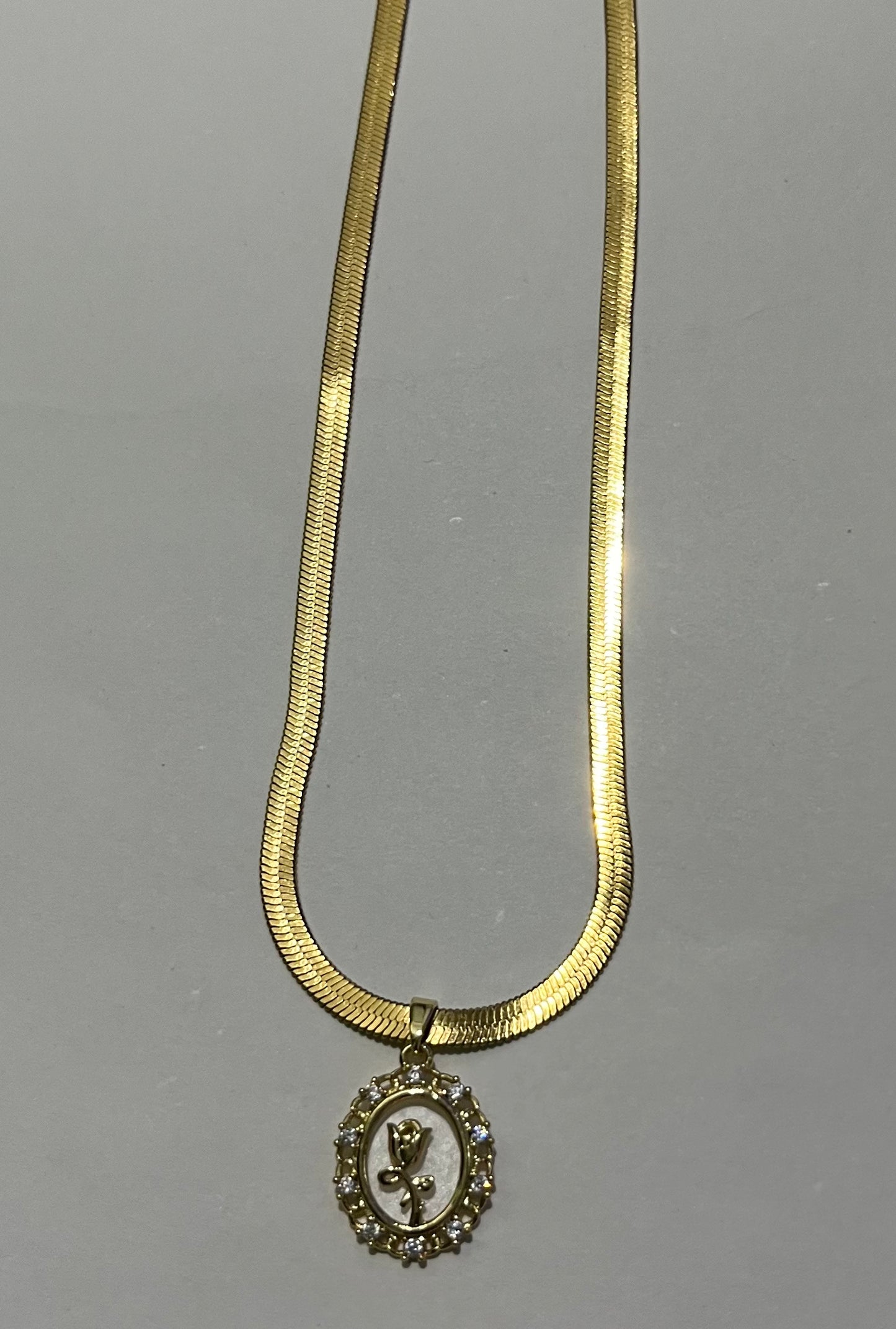 Elegant Gold Necklace with Rose Pendant